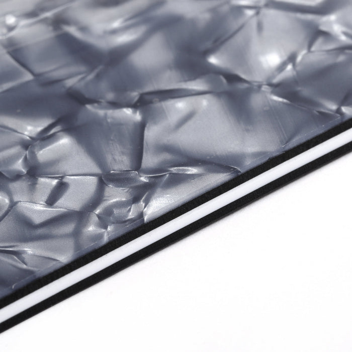 detail of musiclily pro 13 hole p bass pickguard for fender american mexican standard precision bass mx0367