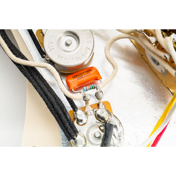 Usage show of musiclily pro treble bleed mod with orange drop 225p polyester capacitor and precision resistor for electric guitar bass mx3125