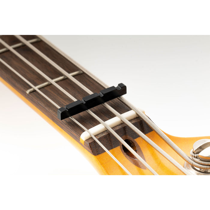 Application of musiclily pro urea resin plastic 40mm slotted jazz bass nuts flat bottom for 4 string j bass mx1990 2p