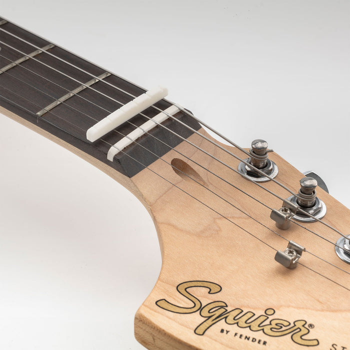 6弦スクワイアーアフィニティーストラトテレスタイルのエレキギター用ミュージックリリーPro 40.5x3x5mmフラットボトムスロット入り骨製ナット（2個セット）